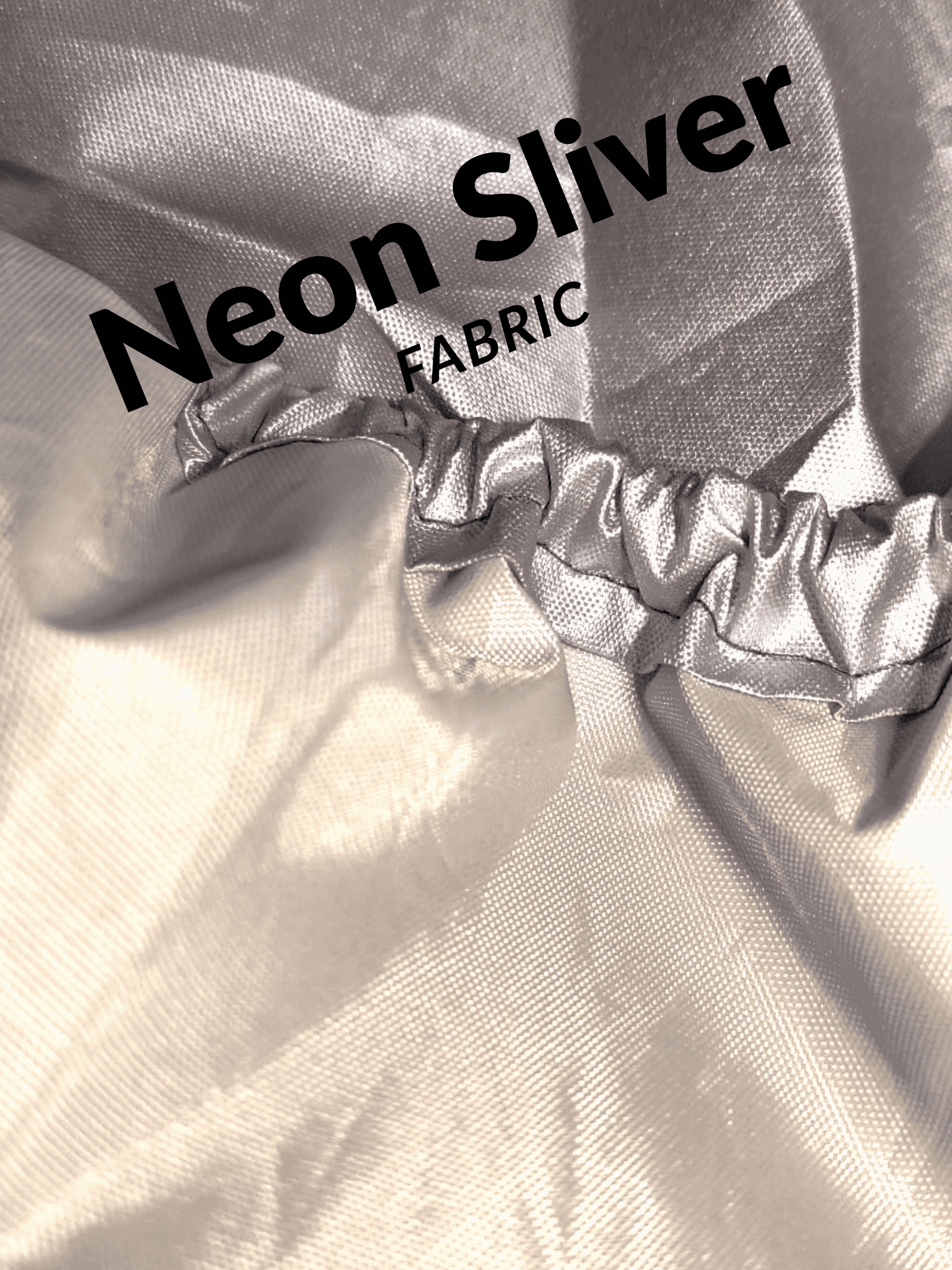 Neon silver fabric with text overlay on a textured background
